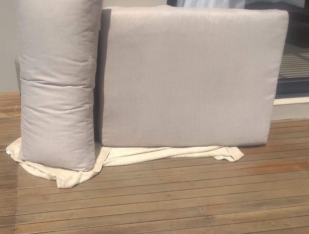 Couch after the pet urine smell removal drying in the sun